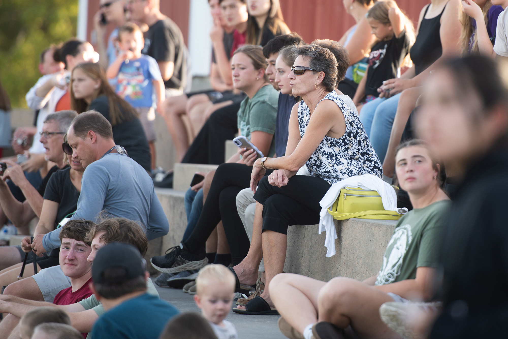 Homecoming 2024 family festival - students, alumni and fans cheer on the Lark flag football team