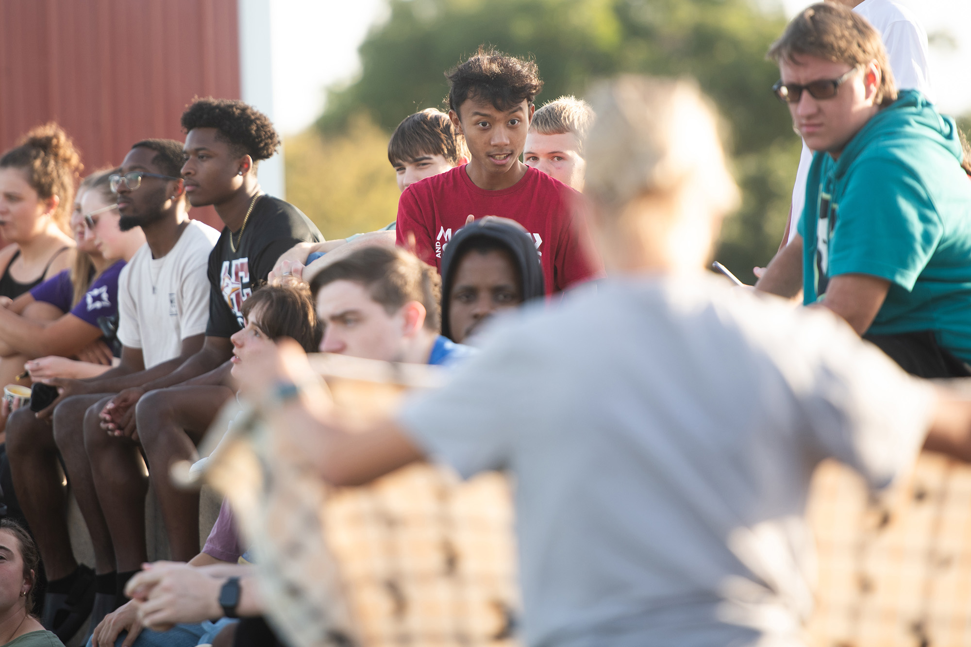 Homecoming 2024 family festival - students, alumni and fans cheer on the Lark flag football team