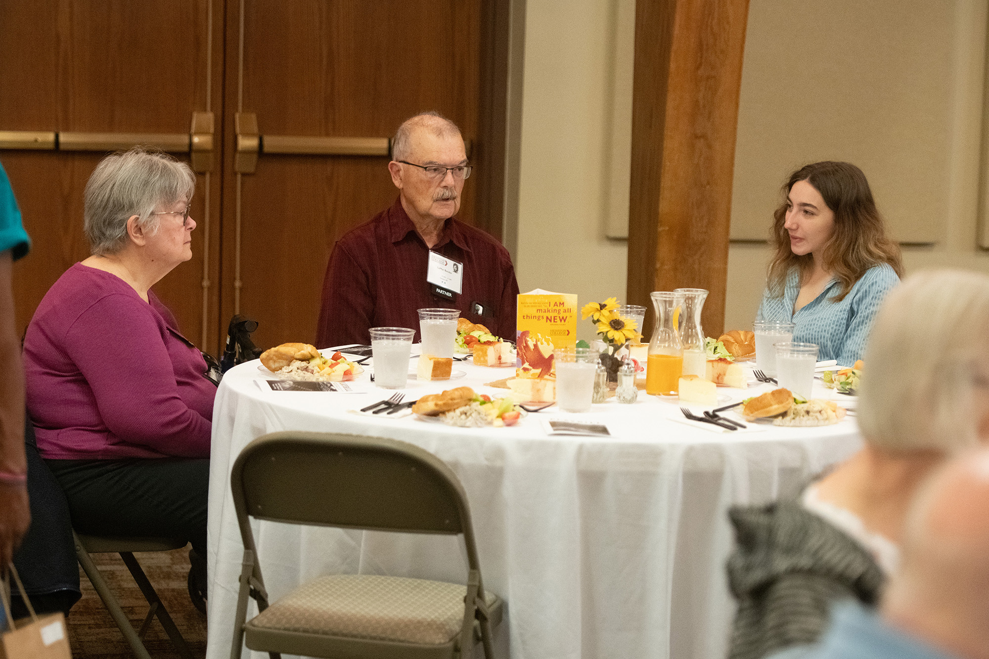 Alumni and friends gather to learn about the history of theatre at Hesston College at the Golden Gables Luncheon