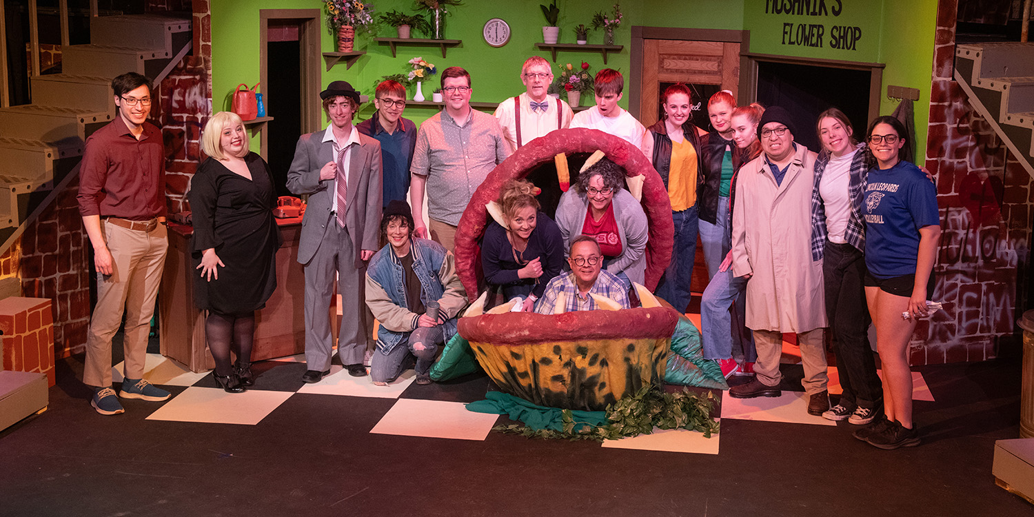 cast and crew photo from the Hesston College Theatre production of Little Shop of Horrors